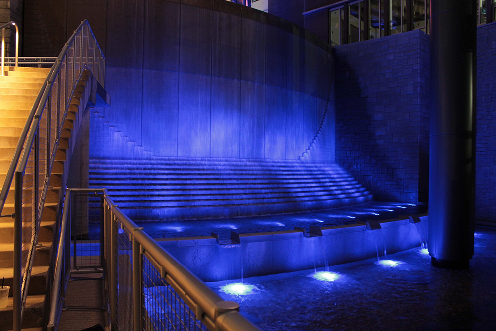 Ground-level interactive fountain with programmable water jets at The Battery Atlanta.